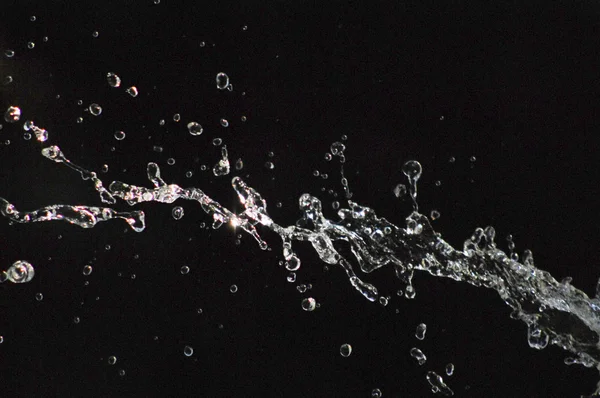 Flying fountain bubbles water — Stock Photo, Image