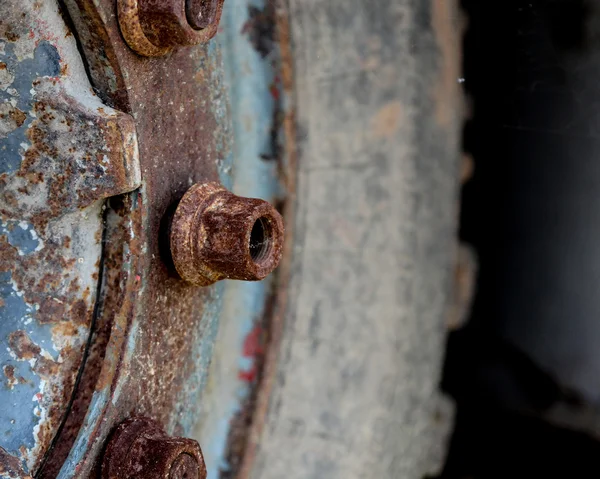 Details close upof and old rusty truck wheel — Stock Photo, Image