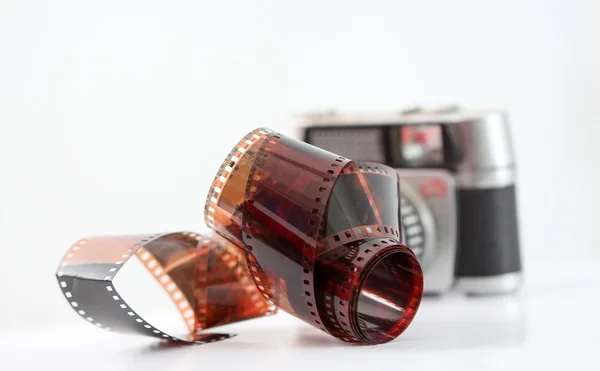 Vintage camera film roll on white background — Stock Photo, Image