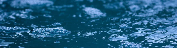 Bubbles, water on blue background — Stock Photo, Image