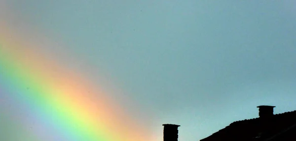 Rainbow over chimney — Stock Photo, Image