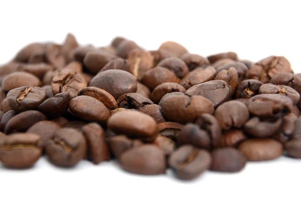 Roasted coffee beans and solated on a white background — Stock Photo, Image