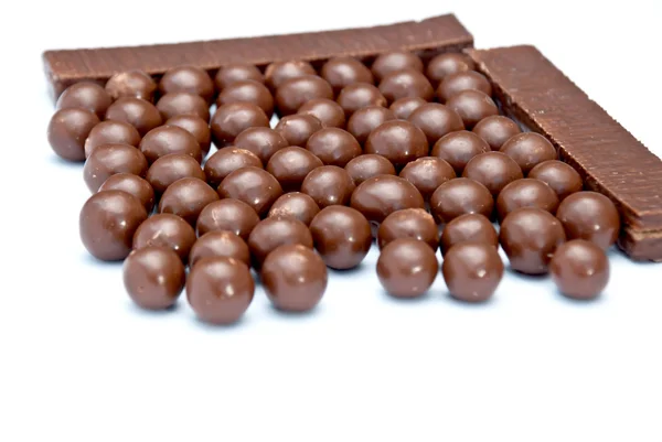 Bolas e barras de chocolate de cereais — Fotografia de Stock