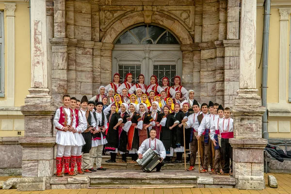 RESEN, MACEDONIA - NOVEMBER 25:Members of folk group Tashe Miloshevski , posing in yard of a well known building Saray in Macedonia.Resen , Macedonia on november 25, 2013 — Stock Photo, Image