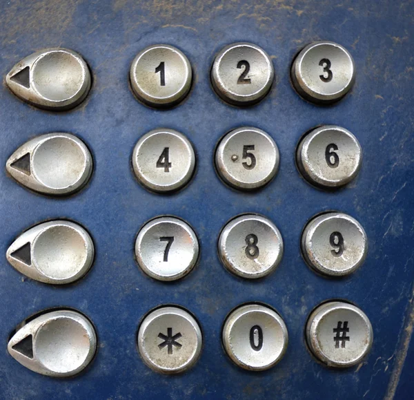 Nahaufnahme einer schmutzigen und staubigen Payphone-Tastatur — Stockfoto