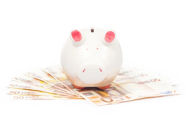 Piggy bank with banknotes — Stock Photo, Image