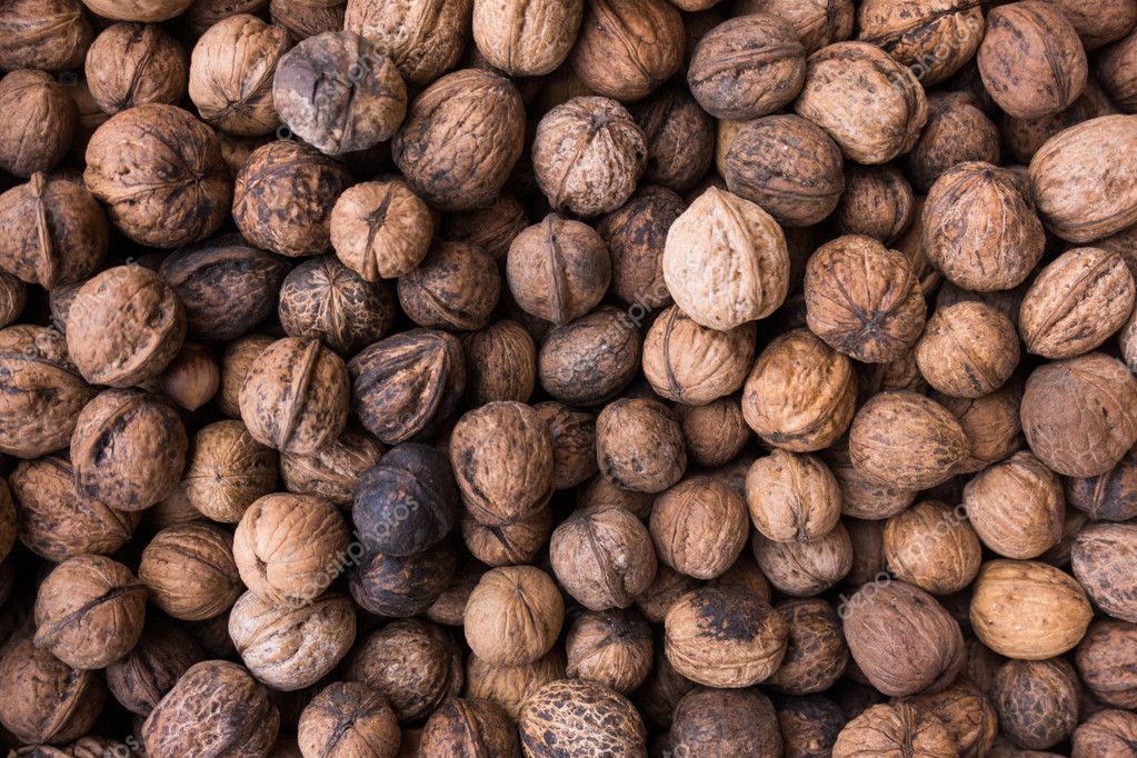 Unshelled walnuts texture Stock Photo by ©ewastudio 101751638