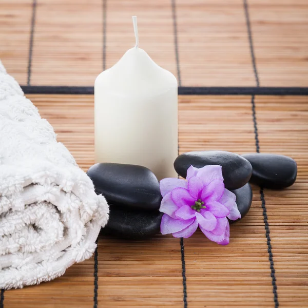 Zen stones, candle and flower — Stock Photo, Image