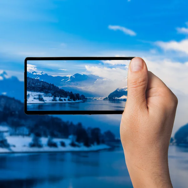 Persoon nemen foto op smartphone — Stockfoto