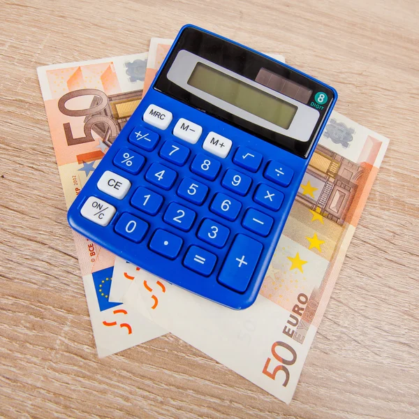 Calculator with Euro banknotes. — Stock Photo, Image