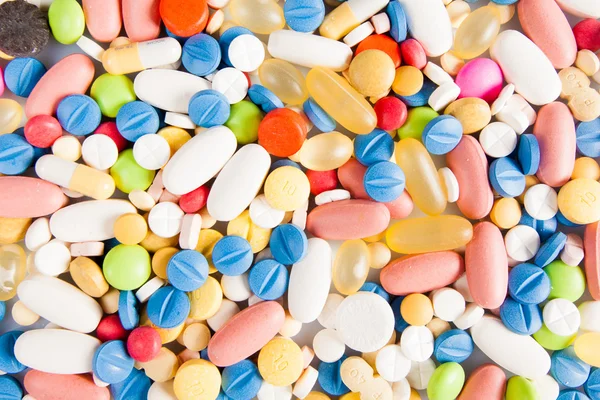 Várias pílulas coloridas — Fotografia de Stock