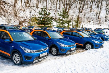 Krasnodar region, Sochi, Russia - February 15 2020.  Car-sharing Belka  in the parking.  Car rental takes place through a mobile application. Moscow company Belka Car  clipart