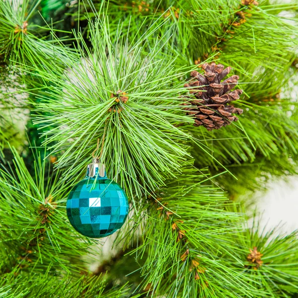 Blue ball on fir branches — Stock Photo, Image