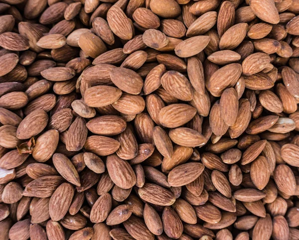 Almonds background, close-up — Stock Photo, Image