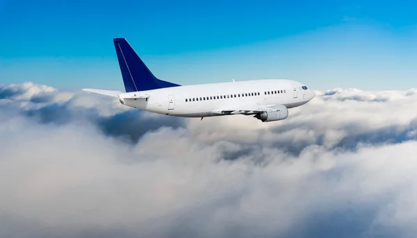 Passenger airplane flying Stock Image