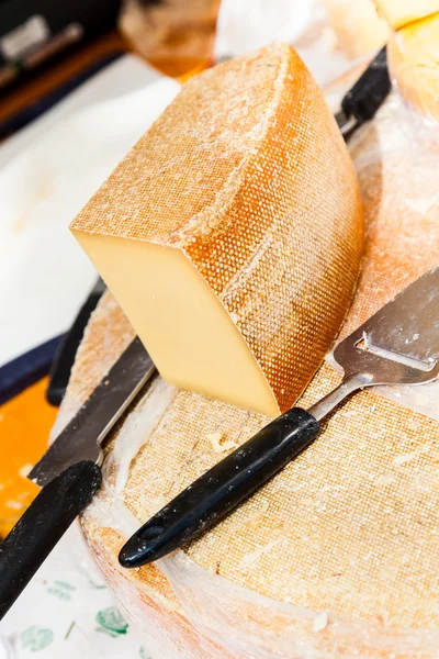 Tasty Cheese and knives — Stock Photo, Image