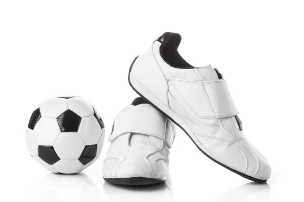 Shoes and soccer ball — Stock Photo, Image