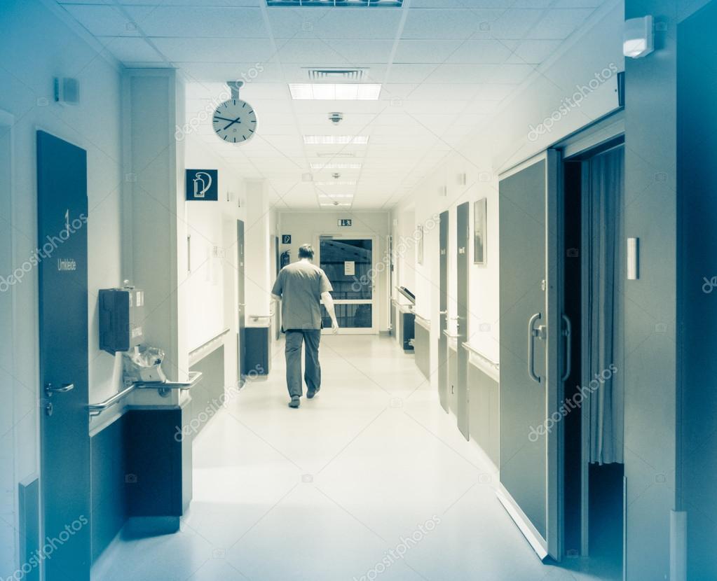 Doctor in corridor at the hospital.