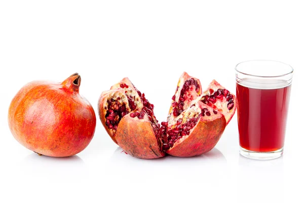Pomegranates and  Pomegranate juice Royalty Free Stock Images