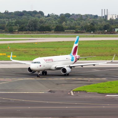 A Eurowings airplane is approaching Dusseldorf Airport