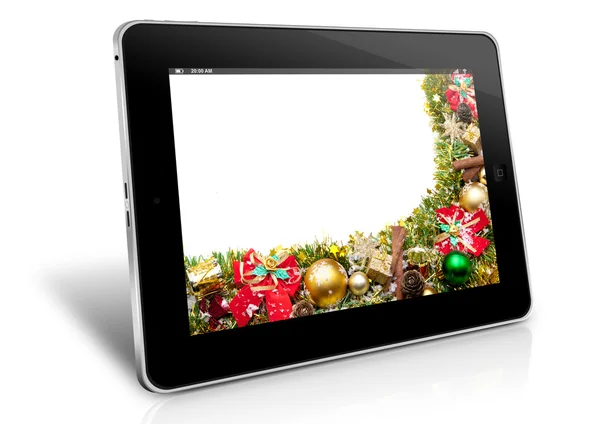 Tablet z ozdób świątecznych na ekranie — Zdjęcie stockowe