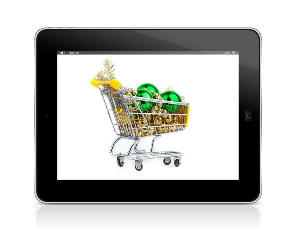 Carrinho de compras na tela do tablet . — Fotografia de Stock