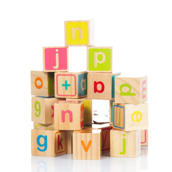 Cubos de juguete de madera con letras . —  Fotos de Stock