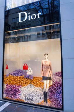 Window view of Dior store clipart