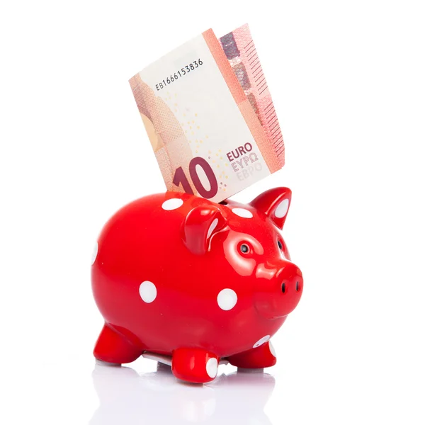 Piggy bank met tien Euro biljet — Stockfoto