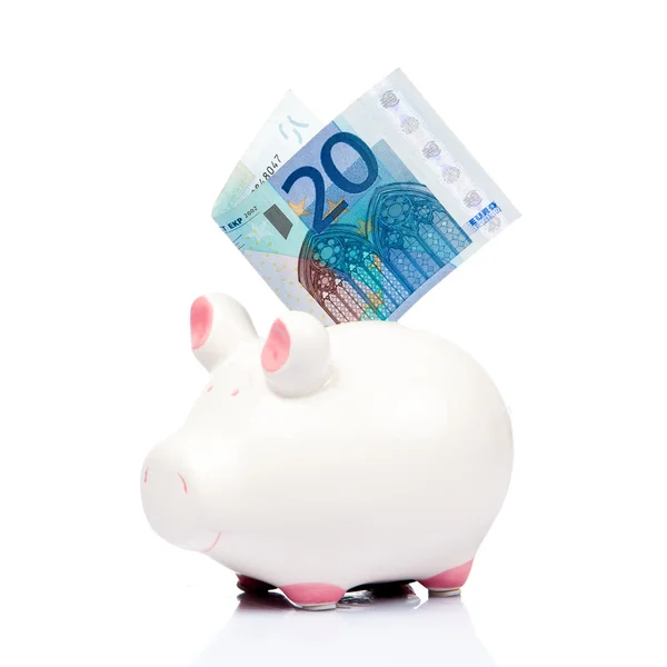 Банк свиней с банкнотой евро — стоковое фото
