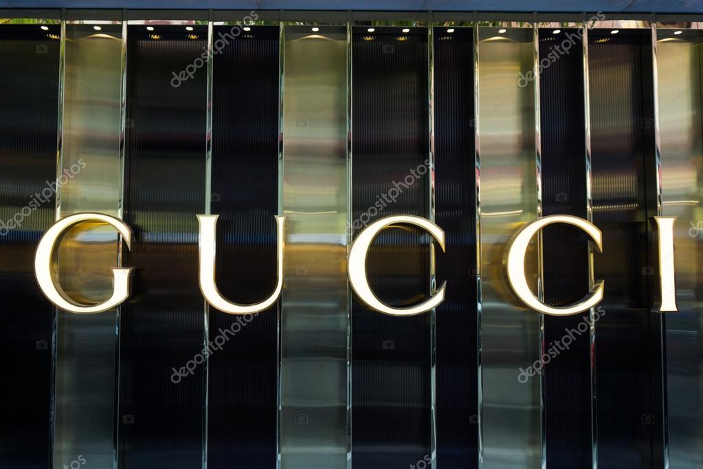 FRANKFURT, GERMANY - OCTOBER 24, 2015:  Gucci signage at store entrance. Gucci is an Italian fashion label owned by French company PPR. Gucci was founded by Guccio Gucci in Florence in 1921