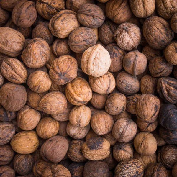 Unshelled walnuts texture — Stock Photo, Image