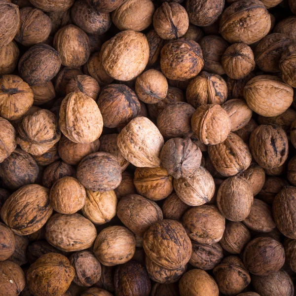 Unshelled walnuts texture — Stock Photo, Image