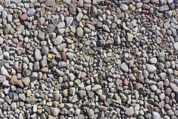 Fragmento de uma praia de pedra do mar ideal — Fotografia de Stock