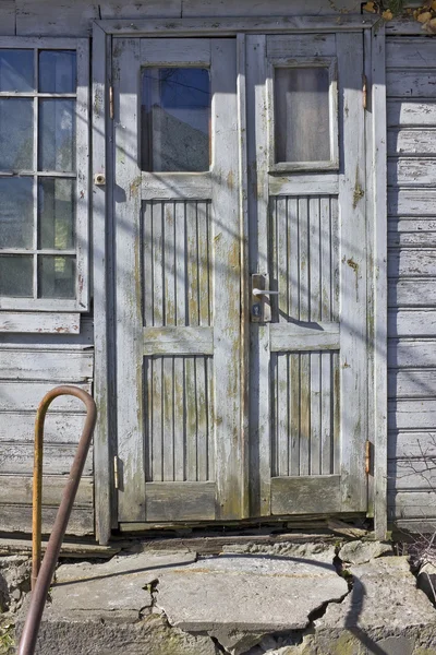 Blue rotten door — Stock Photo, Image