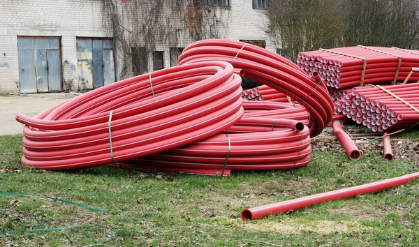 Červené plastové trubky — Stock fotografie