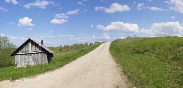 Curve shed at the beginning of the road — Stock Photo, Image