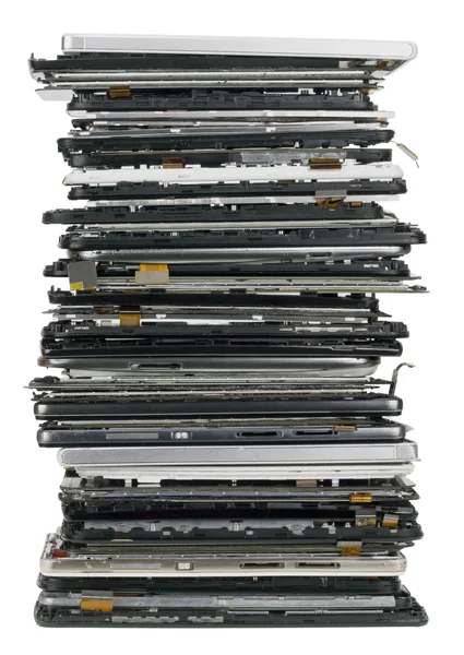 Heap vertical dos telefones celulares quebrados — Fotografia de Stock