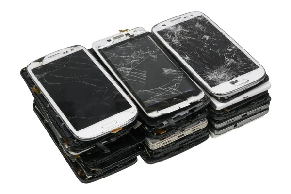 Bloque de los teléfonos móviles rotos — Foto de Stock