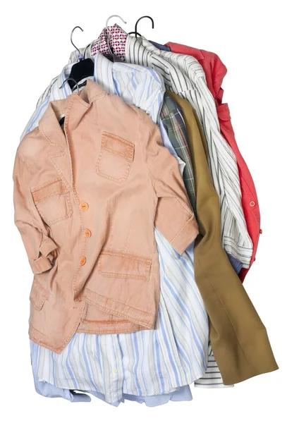Women's and men's wear on hangers — Stock Photo, Image