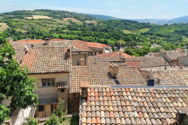 roofs  mountains and  olive gardens 
