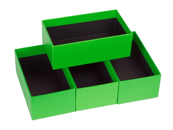 Green boxes wish black velvet — Stock Photo, Image
