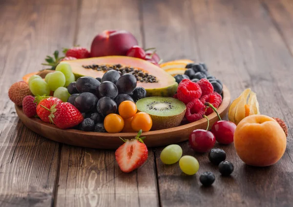 Fresh Raw Organic Summer Berries Exotic Fruits Wooden Plate Light — Stock Photo, Image