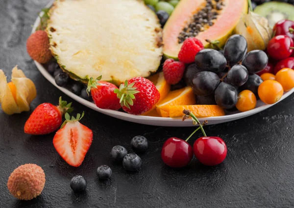 Fresh Raw Organic Summer Berries Exotic Fruits White Plate Black — Stock Photo, Image