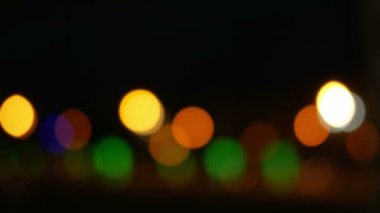 Güzel arka plan: bulanık şehir hayatı. Renkli dairesel bokeh