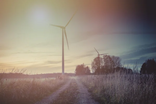 Wind turbine at sunset — Stock Photo, Image