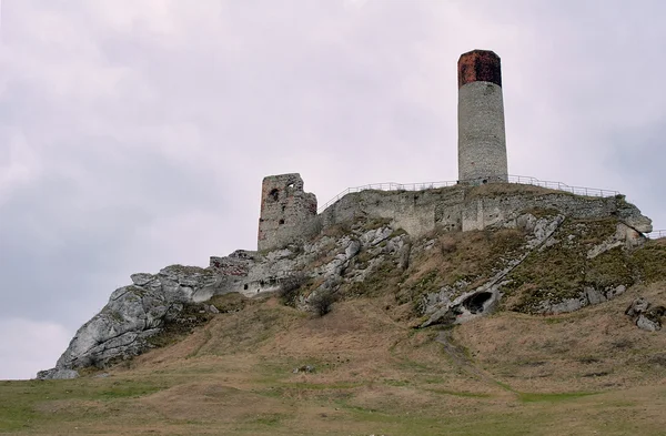 Rocks and ruined medieval tower — Stock Photo, Image