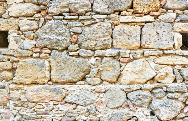 Fragment van middeleeuwse stenen muur — Stockfoto