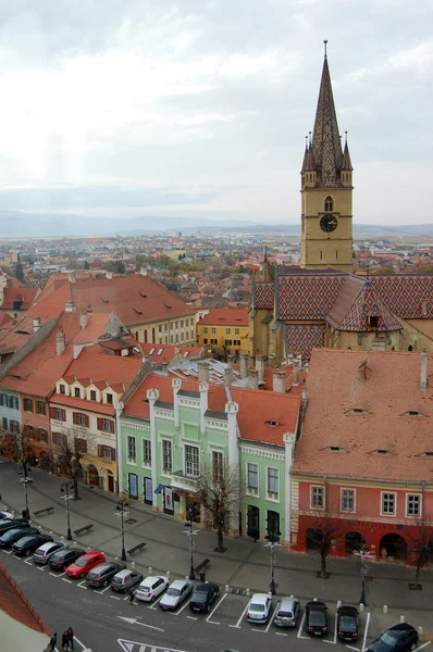 Urban scene across built up area showing roof tops — Stock Photo, Image