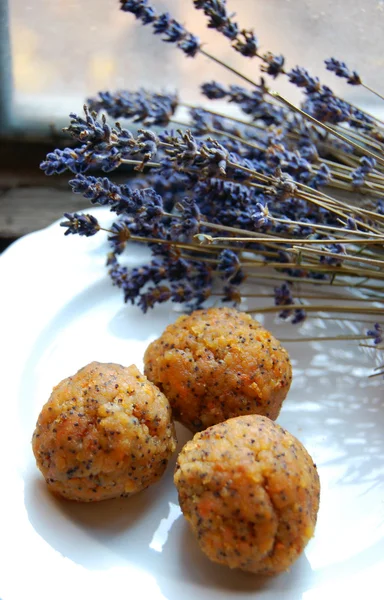 Carrot truffles with lavender on a plate — Stock Photo, Image